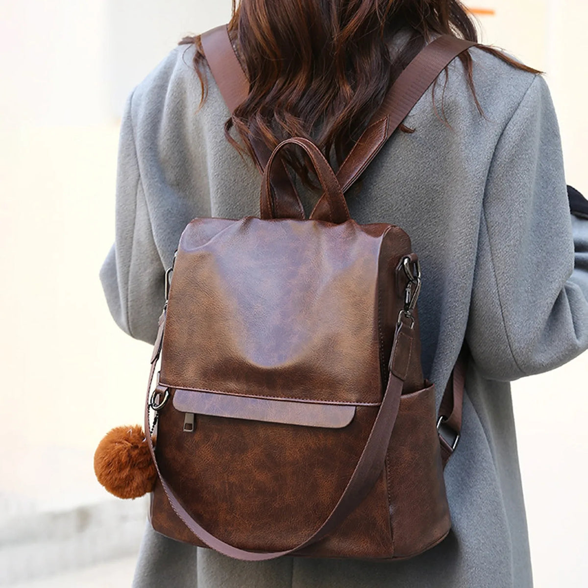 Photo of woman wearing a brown minimalist korean backpack 