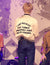 Photo of Jimin backing the crowd in his Nostalgia Bomber Jacket