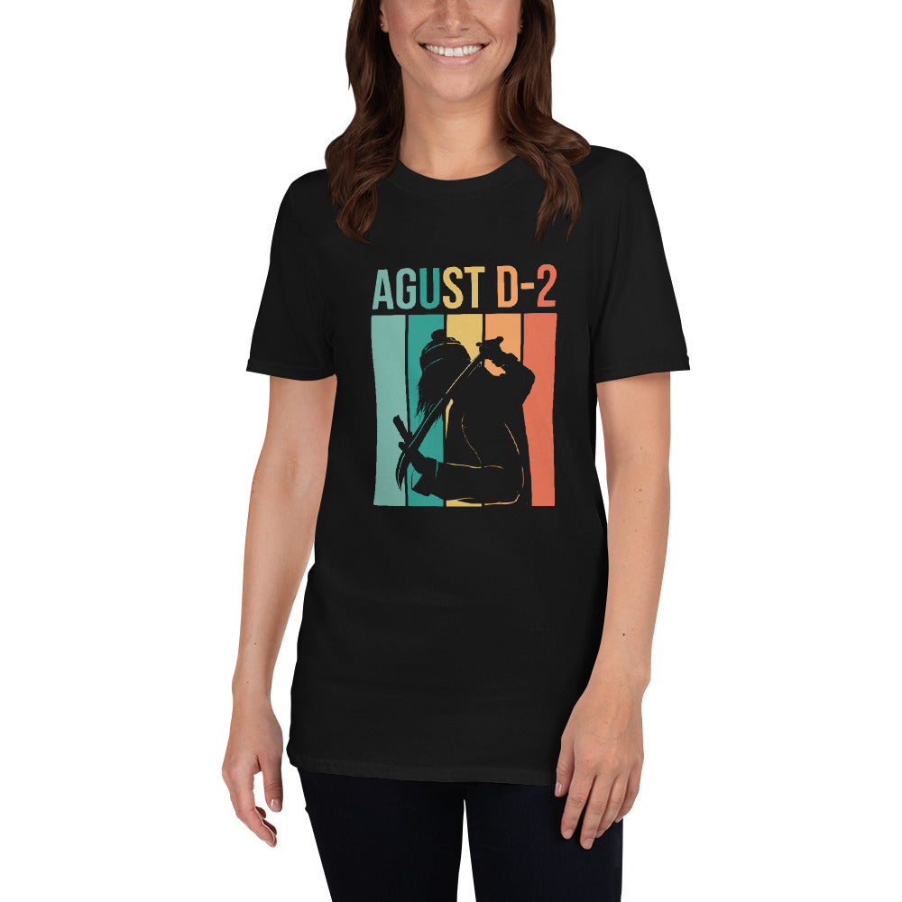 Model wearing an Agust D-2 Short-Sleeve Unisex T-Shirt, featuring a vibrant graphic design with bold colors, representing the spirit of the agustd shirt.
