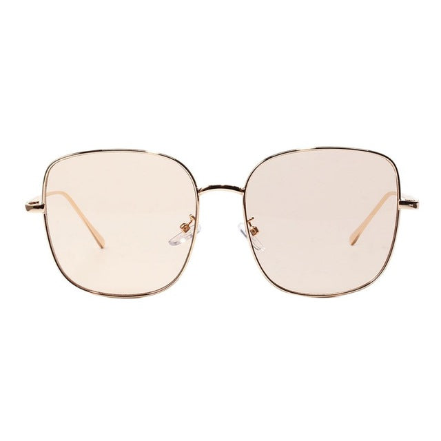 Chic JHope sunglasses with light beige lenses, adding a fashionable touch to any outfit.
