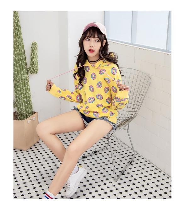 Kpop donut hoodie  showcasing a trendy and cozy look for K-pop enthusiasts.