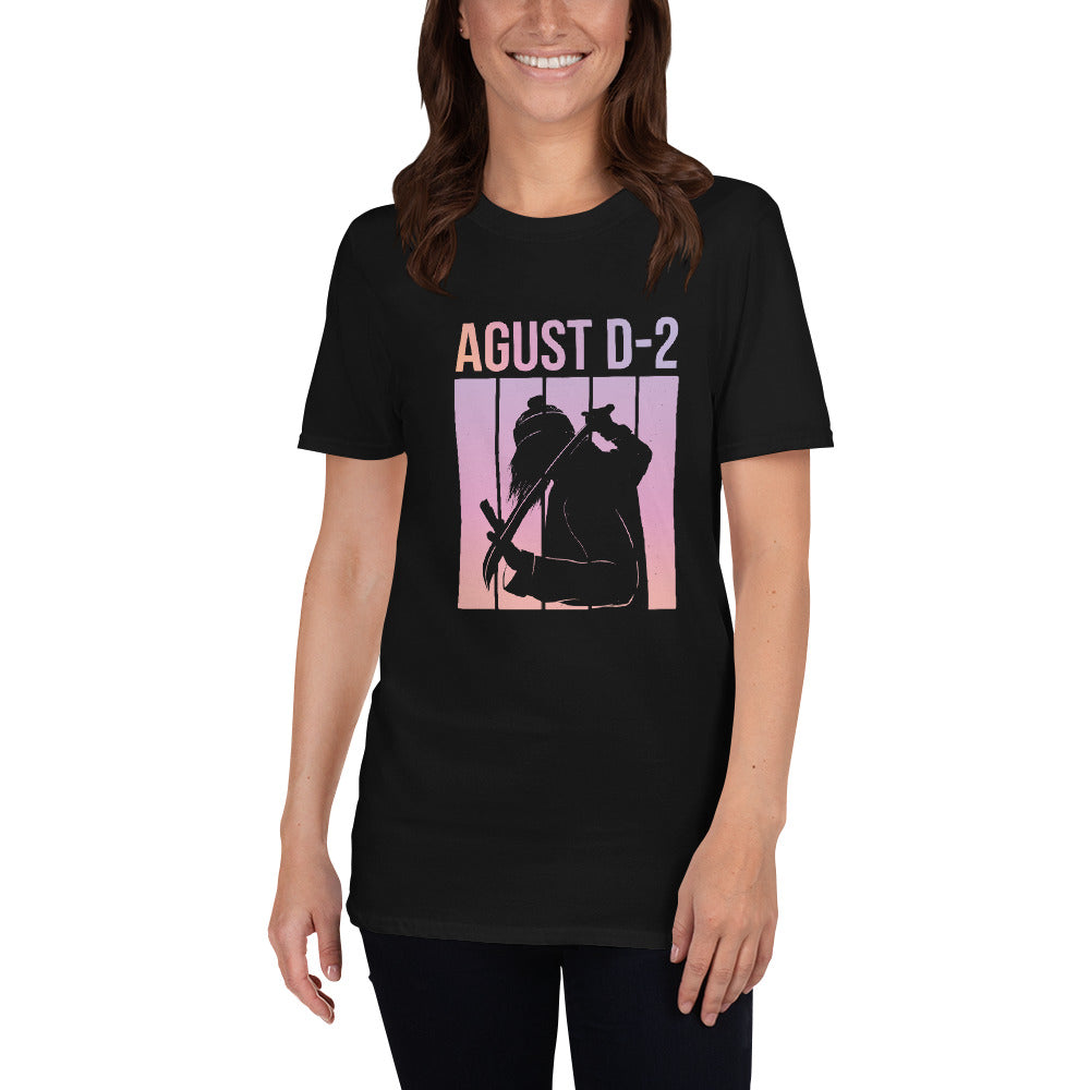 Close-up of a model showcasing the Agust D-2 Short-Sleeve Unisex T-Shirt with a unique silhouette design, highlighting the agustd shirt style.
